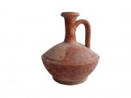 Lagynos with red, partially preserved slip, spout broken and reattached, South Italy, c. 400 B.C., height 17 cm