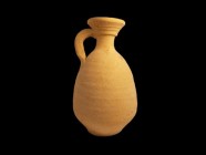 Creamware pottery Jug. The vessel has a plain wide rim and a handle extending from the neck to the shoulders, sits on a short foot with a flat base, 1...