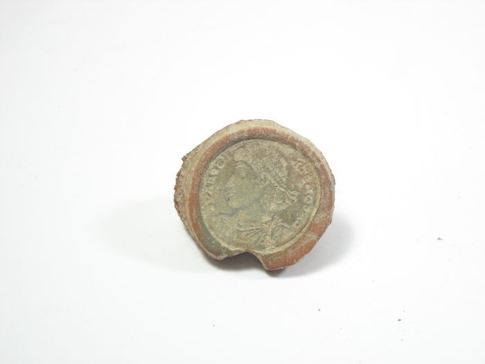 Ceramic coin mould for the production of counterfeit money ceramic, Roman, 4th c...