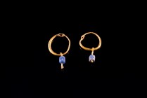 Pair of Byzantine Gold Earrings with blue stone pendants, c. 6th-8th century A.D., 11x17mm