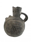 Chimú clay vessel, One handled grey ware jug, canteen form with plume ornament. Intact. Ca. 900-1470 A.D., height 23 cm