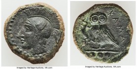 SICILY. Camarina. Ca. 420-405 BC. AE tetrantes or trionkia (15mm, 3.42 gm, 2h). VF. Ca. 410-405 BC. Head of Athena left wearing crested Attic helmet d...