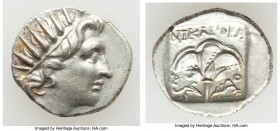 CARIAN ISLANDS. Rhodes. Ca. 88-84 BC. AR drachm (15mm, 2.29 gm, 12h). AU. Plinthophoric standard, Nicagoras, magistrate. Radiate head of Helios right ...
