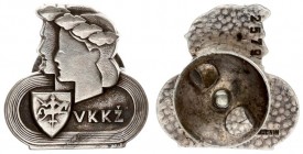 Lithuania Badge 1940 made by Huguenin. Averse: Panorama of stadium; stylized Vytis on the left side and VKKŽ entry on the right. Reverse: Company name...