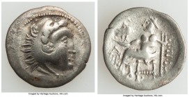 DANUBE REGION. Balkan Tribes. Imitating Philip III Arrhidaeus (323-317 BC). Ca. 2nd century BC. AR drachm (19mm, 2.80 gm, 10h). VF. Head of Heracles r...