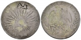 México. (Hacia 1872-1877). 12,75 g. Resello llave (De Mey 480) sobre 4 reales de Guanajuato de 1846 para circular por Cuba. Rara. BC-. Est...250,00.
