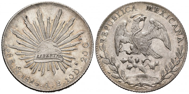 México. 8 reales. 1896. México. AB. (Km-377.10). Ag. 27,00 g. Tono. Restos de br...