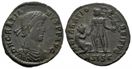 Graciano. Maiorina. 379-383 d.C. Siscia. (Spink-20008). (Ric-26a). Rev.: REPARATIO REI PVB. Graciano en pie a izquierda saludando a mujer a sus pies c...