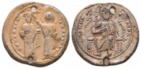 Imperial lead seal of Constantine X Doukas (1059-1067).
Obverse: Christ Emmanuel seated on a lyre-backed throne, wearing a tunic and himation with the...