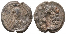 Byzantine lead seal with saint Demetrios/inscription
(ca 11th cent.)
Obv.: Bust of saint Denetrios, facial, nimbate, holding spear and shield, sigla w...