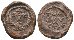 Byzantine lead seal of John stratelates
(7th cent.)
Obv.: Eagle to right with open wings, cruciform monogram over his head reading as ΘΕΟΤΟΚΕ ΒΟΗΘΕΙ (...