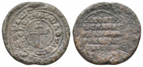 Byzantine lead seal of Leontios imperial spatharios
(ca 10th cent.) An overstruck seal
Obv.: Patriarchal cross on 2 steps, circular invocative inscrip...