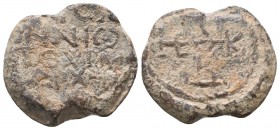 Byzantine lead seal of Ouranios Hyparchos
(7th/8th cent.)
Obv.: Cruciform monogram reading as, ΘΕΟΤΟΚΕ ΒΟΗΘΕΙ/ 
Rev.: Inscription in 4 lines, + ΟΥΡΑΝΝ...