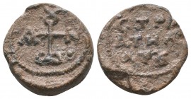 Byzantine lead seal of John stratelates
(7th cent.)
Obv.: Cruciform monogram reading as, ΙΩΑΝΝΟΥ/ 
Rev.: Inscription in 3 lines, CΤΡΑΤΗΛΑΤΟΥ 
(of John...