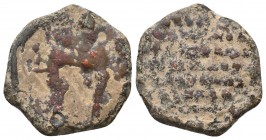 Byzantine AE Tessera of Tornikios proedros
(circa AD 1170-1200)
Obverse: Apostles Peter and Paul full sized, in profil, embracing each other, columnar...