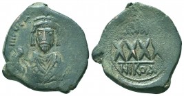 Phocas (602-610 AD). AE Follis

Condition: Very Fine

Weight: 12.50 gr
Diameter: 30 mm