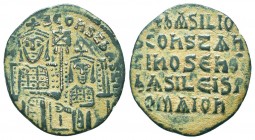 Basil I, the Macedonian. 867-886. AE follis. Constantinople mint, struck 870-879. + LЄOn ЬAS COnSτ AЧςς, crowned half-length facing busts of Basil, we...