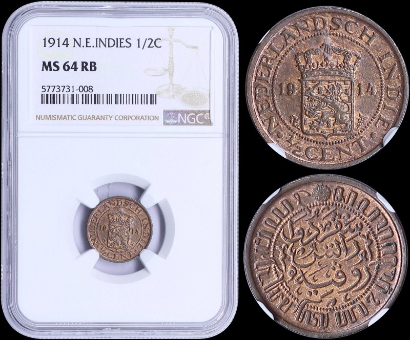 NETHERLANDS EAST INDIES: 1/2 Cent (1914) in bronze with crowned Arms divide date...