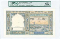 MOROCCO: 1000 Francs (1.3.1945) in green, blue and ochre with view of city. S/N: "T.216 087". WMK: Lions head. Inside holder by PMG "Choice Extremely ...