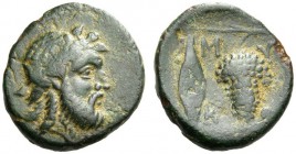 CYCLADES, Mykonos. 3rd-1st century BC. Dichalkon (?) (Bronze, 19mm, 4.45 g 6). Bearded head of Dionysos to right, wearing ivy wreath. Rev. M-Y/K-O Gra...