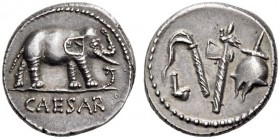 Julius Caesar, 49-48 BC. Denarius (Silver, 16mm, 3.58 g 11), mint moving with Caesar. CAESAR Elephant trampling serpent to right. Rev. Priestly implem...