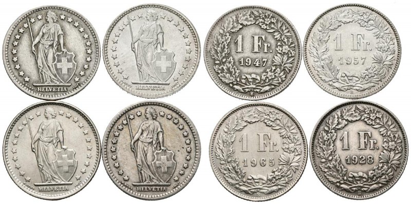 MONEDAS EXTRANJERAS. Conjunto de 4 monedas suizas de 1 Franc de diferenteas años...