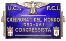 UNIONE CICLISTICA INTERNAZIONALE-FEDERAZIONE CICLISTICA ITALIANA CAMPIONATI DEL MONDO 1939 XVII - distintivo da congressista. Dim. mm. 64x38 
A causa ...