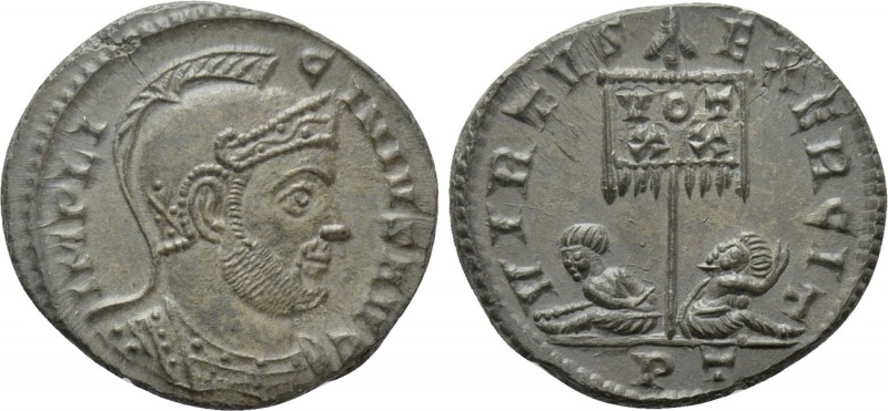 LICINIUS I (308-324). Follis. Ticinum. 

Obv: IMP LICINIVS AVG. 
Helmeted and...