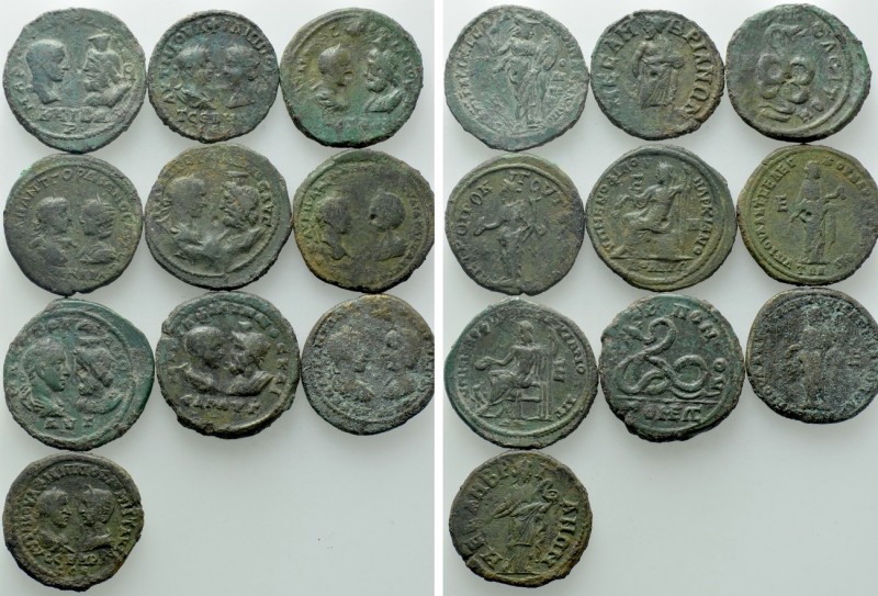 10 Roman Provincial Coins. 

Obv: .
Rev: .

. 

Condition: See picture.
...