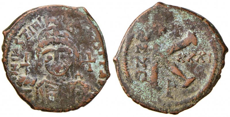 BISANZIO Giustiniano I (527-565) Follis (Antiochia) Busto di fronte - R/ Lettera...
