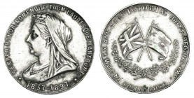 GRAN BRETAÑA. Medalla. IN COM. LX ANN ACC VICTORIAE BRIT. REG. IND. IMP. 1837-1897. Buenos Aires. AR 33 mm. Rayitas. MBC.