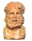 ROMA. Imperio Romano. I-II d.C. Mármol. Cabeza de Baco en altorrelieve. Altura 18,4 cm.