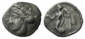 Bruttium, Terina, c. 420-400 BC. AR Diobol (9.5mm, 0.68g, 6h). Female head l., hair bound in sphendone. R/ Nike flying l., holding wreath. Holloway & ...