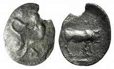 Sicily, Selinos, c. 410 BC. AR Litra (11mm, 0.46g, 12h). Nymph seated l. on rock, r. hand raised above her head, touching serpent rising to l.; selino...