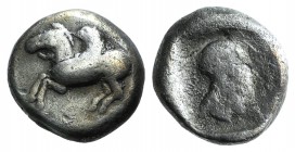 Corinth, c. 500-480 BC. AR Stater (17mm, 8.33g, 10h). Pegasos flying l. R/ Helmeted head of Athena right within incuse square. Pegasi 68; BCD Corinth ...