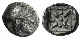 Asia Minor, Uncertain mint, 5th century BC. AR Hemiobol (5mm, 0.41g). Helmeted head of Athena r. R/ Star of four rays; pellets between rays; all withi...