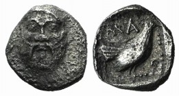 Lesbos, Methymna, c. 500/480-460 BC. AR Tetartemorion (5mm, 0.18g, 6h). Facing head of Silenos. R/ Cock standing r. within dotted square border within...