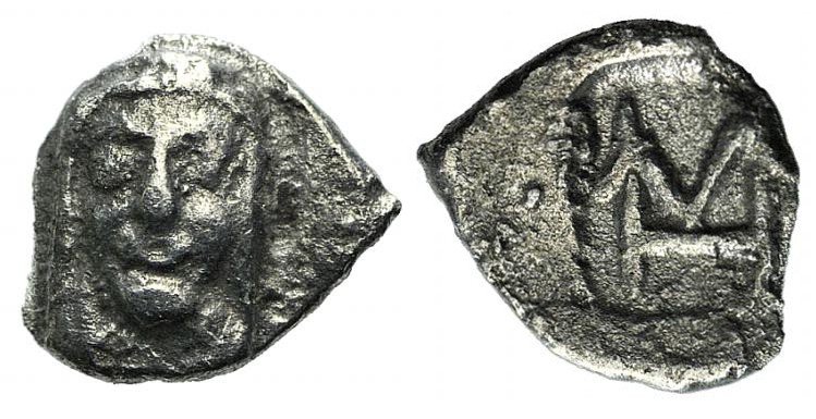 Ionia, Kolophon, c. 450-410. AR Hemiobol (7mm, 0.32g, 12h). Facing head of Apoll...