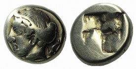 Ionia, Phokaia, c. 478-387 BC. EL Hekte – Sixth Stater (9mm, 2.50g). Female head l., hair bound in sakkos; seal to r. R/ Quadripartite incuse square. ...