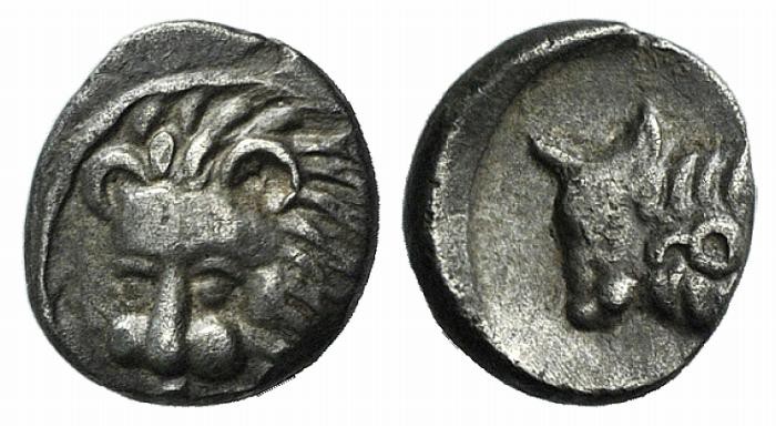 Caria, Uncertain, c. 400 BC. AR Hemiobol (6mm, 0.40g, 12h). Facing lion’s head, ...