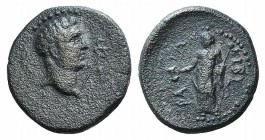 Phrygia, Kibyra, c. 2nd-3rd century AD. Æ (20mm, 5.05g, 11h). Bare head of Hermes r.; caduceus before. R/ KIBYPAIΩN, Figure standing l., holding kanth...