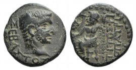 Tiberius (14-37). Phrygia, Philomelium. Æ (17mm, 4.76g, 6h). Titus Philopatris, magistrate. Bare head r. R/ Zeus seated l. on throne, holding patera a...