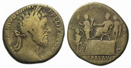 Commodus (177-192). Æ Sestertius (29mm, 19.75g, 12h). Rome, AD 186. Laureate head r. R/ Commodus seated l. on curule chair set on daïs; to r. Prefect ...