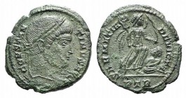 Constantine I (307/310-337). Æ Follis (17mm, 2.91g, 12h). Treveri, 323-4. Laureate head r. R/ Victory standing r., holding trophy and palm, spurning b...