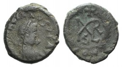 Marcian (450-457). Æ (10mm, 1.24g, 6h). Constantinople, 450-7. Pearl diademed, draped, and cuirassed bust r. R/ Monogram, cross above, within wreath. ...