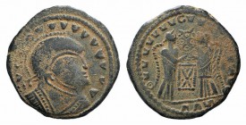 Barbaric imitation, c. 4th-5th century. Æ (17mm, 2.71g, 11h). Helmeted and cuirassed bust r. R/ Two Victories, vis-à-vis, holding inscribed shield. VF...