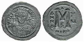 Justinian I (527-565). Æ 40 Nummi (41mm, 23.74g, 6h). Nicomedia, year 15 (541/2). Helmeted and cuirassed bust facing, holding globus cruciger and shie...