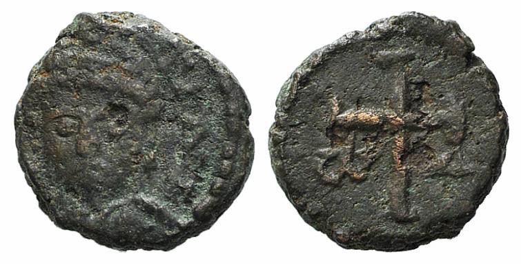 Justinian I (527-565). Æ Nummus (9mm, 1.07g, 12h). Uncertain mint. Helmeted and ...
