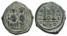 Justin II and Sophia (565-578). Æ 40 Nummi (30mm, 14.81g, 6h). Nicomedia, year 13 (577/8). Crowned and cuirassed bust facing, holding cross on globe a...