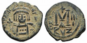 Heraclius (610-641). Æ 40 Nummi (30mm, 11.47g, 6h). Cyzicus, year 4 (613/4). Helmeted and cuirassed facing bust, holding cross and shield with horsema...